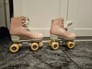 Patinas 4 ruedas Oxelo color rosa talla 35