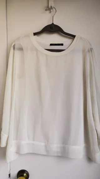 Blusa crema manga larga. Con transparencia