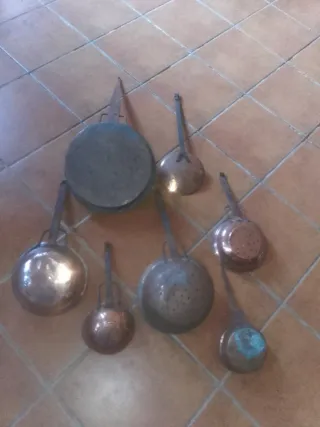 Antiguos cazos y espumadera