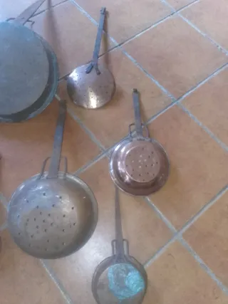 Antiguos cazos y espumadera
