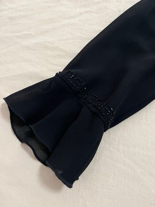 Blusa fiesta negra de Nicchi