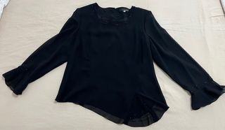 Blusa fiesta negra de Nicchi