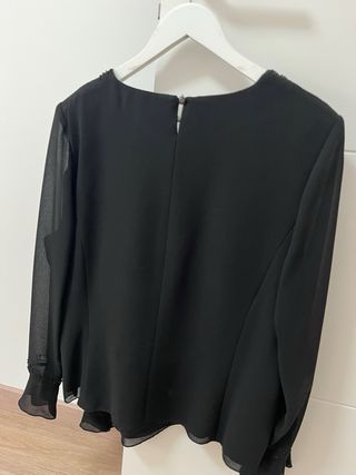Blusa fiesta negra de Nicchi