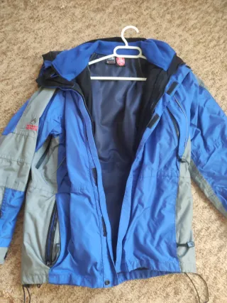 Anorak The North Face azul y gris