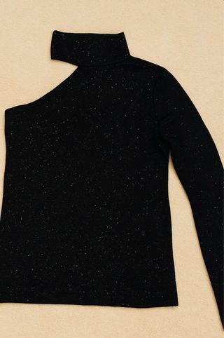 Top asimétrico brillante negro