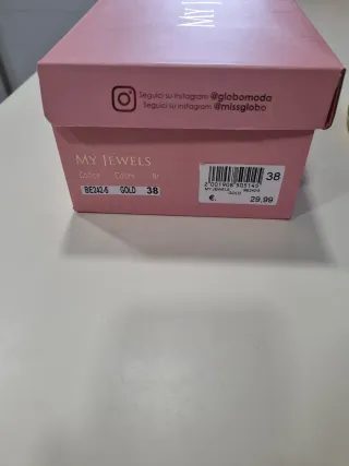 Zapatos de fiesta dorados