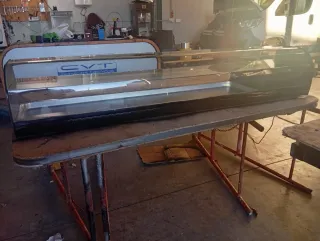 Expositor sobrebarra cristal y acero