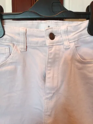 Pantalón vaquero niña rosa pierna ancha crop