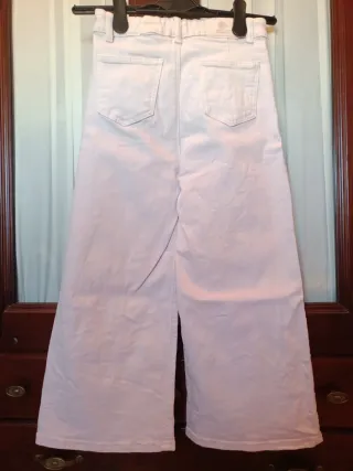 Pantalón vaquero niña rosa pierna ancha crop