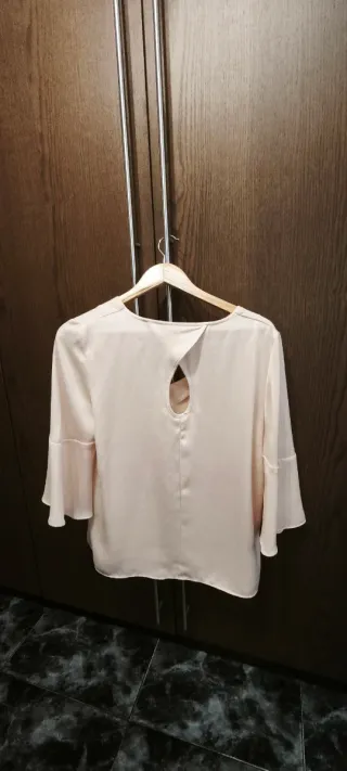 Blusa rosa manga campana