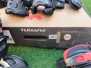 Patines en línea extensibles nuevos y protecciones