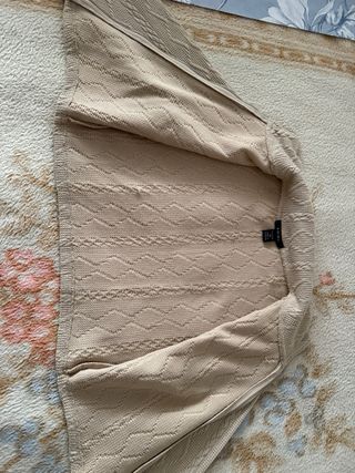 Jersey beige con cremallera