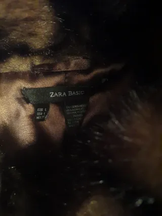 Chaqueta de pelo marrón y multicolor