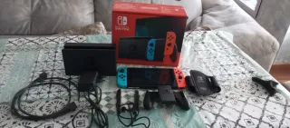 Nintendo Switch Negra y Naranja mandos neon