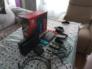 Nintendo Switch Negra y Naranja mandos neon