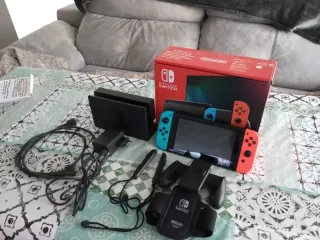 Nintendo Switch Negra y Naranja mandos neon
