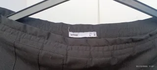 Falda corta plisada negra