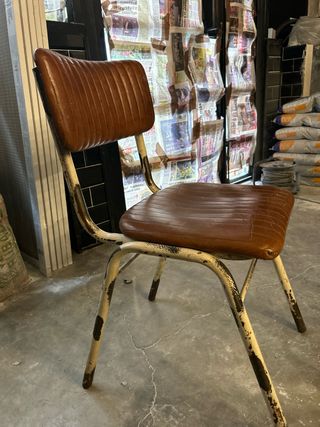 Sedia vintage in pelle e metallo