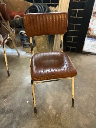 Sedia vintage in pelle e metallo