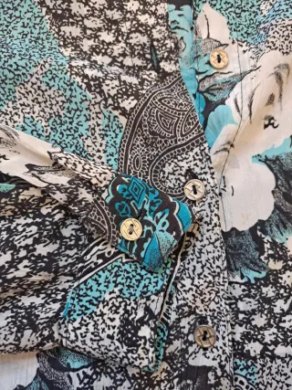 Blusa vintage floral turquesa talla M