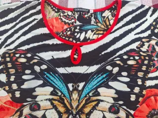 Blusa T 5XL. Medidas en descripción