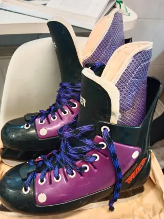 Patines de hockey o patinaje sobre hielo morado