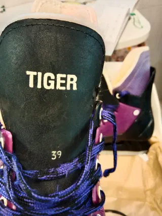 Patines de hockey o patinaje sobre hielo morado