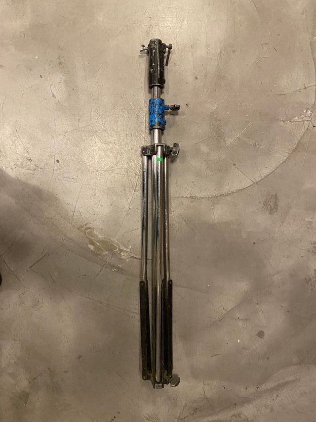 Trípode Manfrotto de acero inoxidable