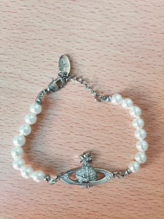 Pulsera Saturn Vivienne Westwood Perlas y Orb
