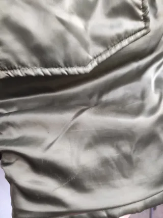 Abrigo Kalare verde con capucha y pelo