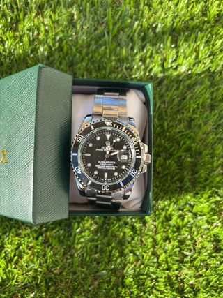 Reloj Date Negro y Plateado. Tengo más modelos