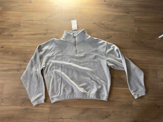 Sudadera gris con cremallera