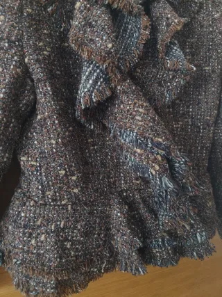 Americana mujer marrón con flecos