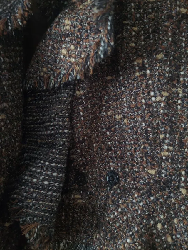 Americana mujer marrón con flecos