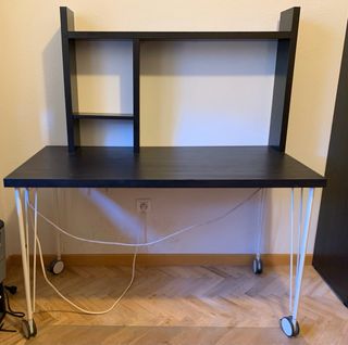 Scrivania nera IKEA con schienale