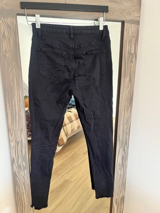 Pantalones negros vaqueros