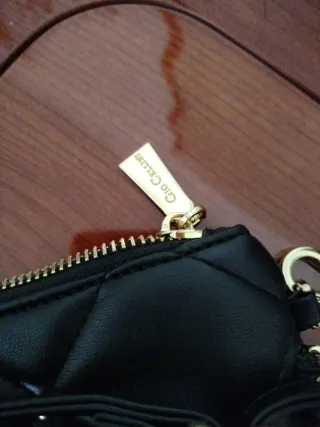 Borsa Gio Cellini Nera con Dettagli Oro