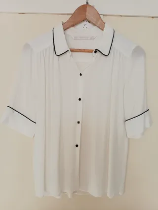 Blusa Zara blanca con borde negro
