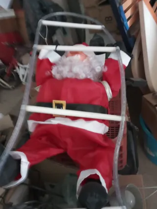 Papá Noel con rollo de luces