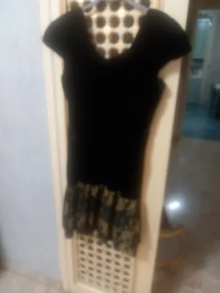 Abitino nero con dettagli oro