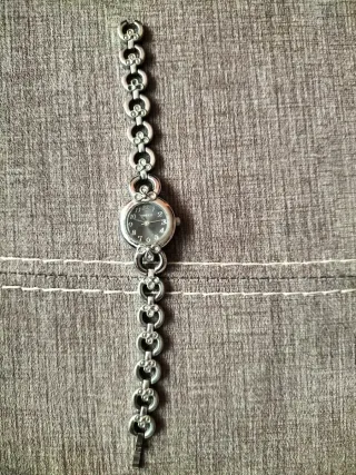 Reloj Timex Plata y Negro LO VENDO SIN PILA