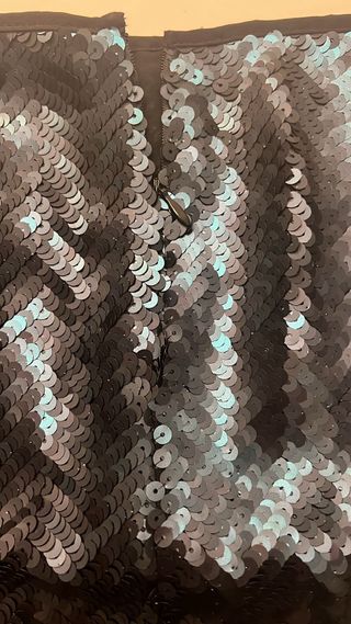 Falda corta lentejuelas negro y turquesa