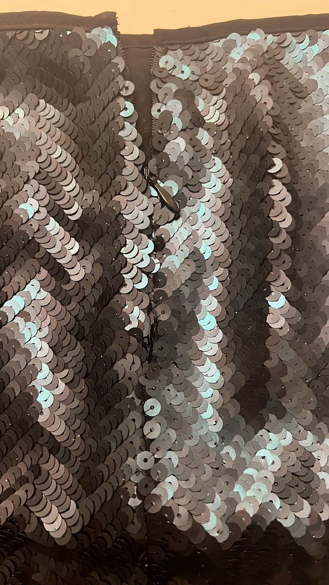 Falda corta lentejuelas negro y turquesa