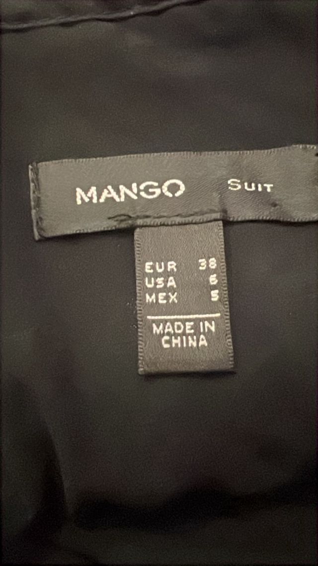 Falda corta lentejuelas negro y turquesa