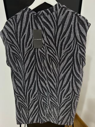 Blusa Sfera plateada y negra