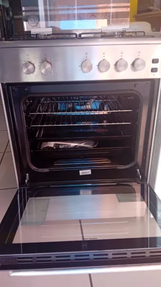 Cocina Candy 4 Zonas Gas Horno 55L