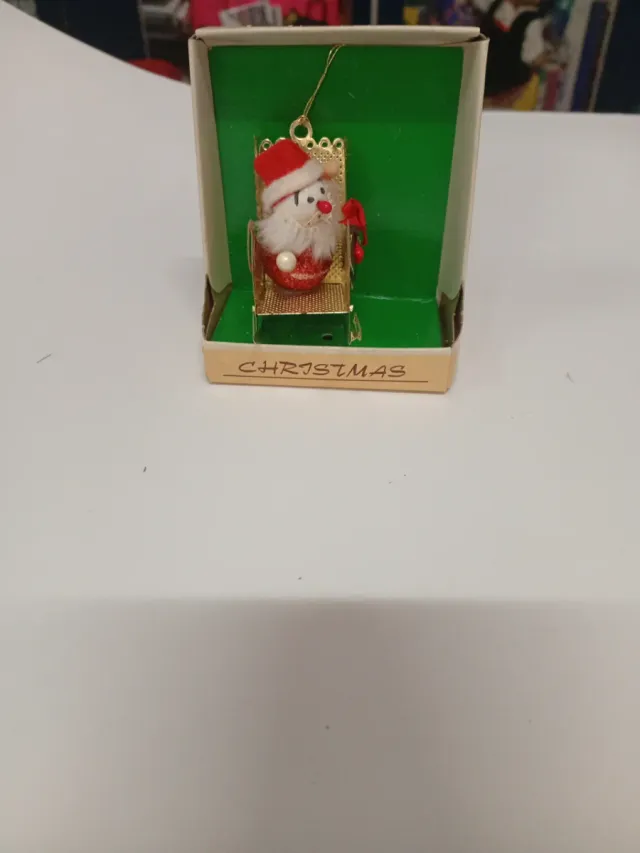 Decoração de Natal Papai Noel na Cadeira de Balanço