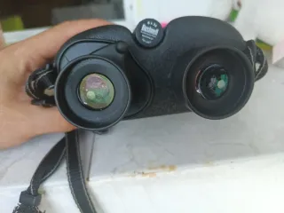 Prismáticos Bushnell Yardage Pro 1000mtros