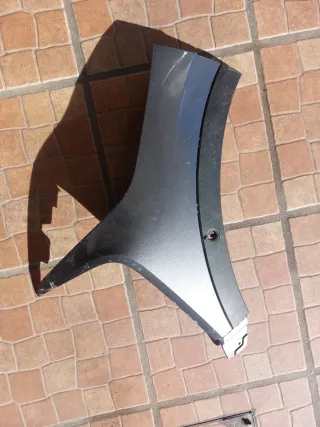 Grelha Esquerda Parachoques Renault Megane