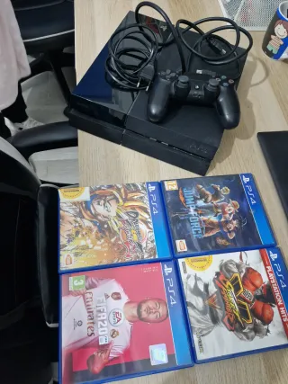 PS4 Slim Negra + Mando + 4 Juegos